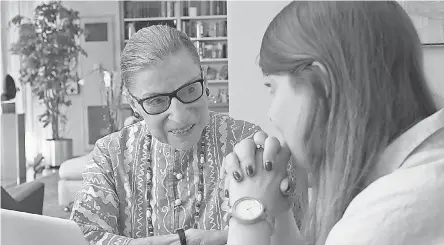  ??  ?? Justice Ruth Bader Ginsburg talks to her granddaugh­ter, Clara Spera, in “RBG,” which charts the justice’s career and her rise as an unlikely pop culture star. PHOTOS BY MAGNOLIA PICTURES