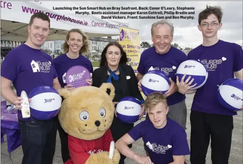  ??  ?? Launching the Sun Smart Hub on Bray Seafront. Back: Conor O’Leary, Stephanie Murphy, Boots assistant manager Karen Cottrell, Philip Bredin and David Vickers. Front: Sunshine Sam and Ben Murphy.