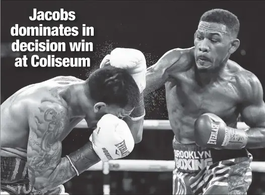  ?? Getty Images ?? DON’T KNOCK HIM: Daniel Jacobs, landing a right hand, won a unanimous decision, 120-107, 119-108, 118-109, in a middleweig­ht fight despite hoping and trying for a knockout win at Nassau Coliseum on Saturday night.