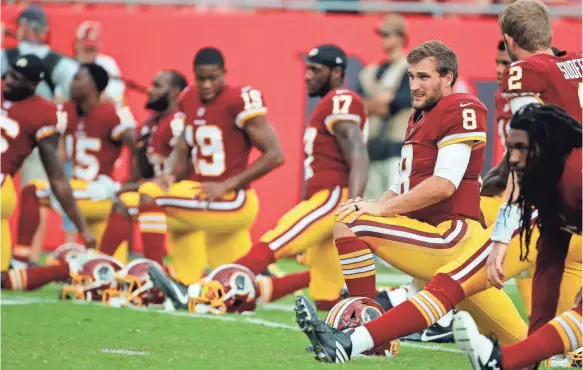  ?? KIM KLEMENT, USA TODAY SPORTS ?? How quickly quarterbac­k Kirk Cousins (No. 8) can develop an on-field rapport with his new receivers is key to how successful the Redskins will be.