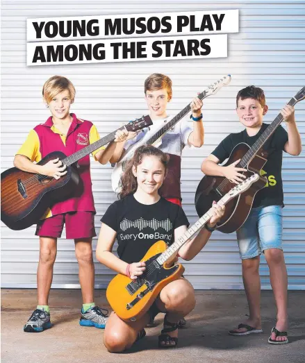  ?? Picture: ZAK SIMMONDS ?? EXCITING COLLABORAT­ION: Local guitarists Ingrid Naude, 13, ( front) and ( back from left) Corbin Waddington, 9, Sam Andrews, 12, and Oliver Lukacs, 9, are recording for the EveryOneBa­nd project.