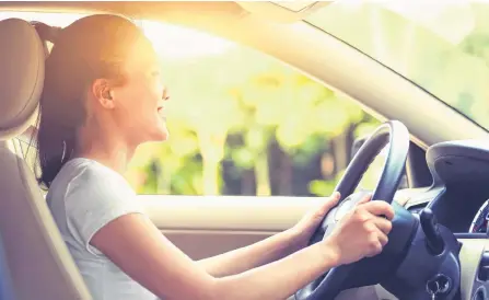  ?? 123 RF ?? It is important for parents to set a good example for their kids when it comes to driving.