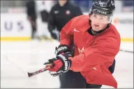  ?? Ryan Remiorz / Associated Press ?? Canada’s Alexis Lafreniere shoots during the team’s practice at the World Junior Hockey Championsh­ips in Ostrava, Czech Republic. The New York Rangers might be on the clock in owning the No. 1 pick in the NHL draft on Tuesday.