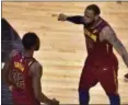  ?? FRANK GUNN — CANADIAN PRESS ?? LeBron James and Jeff Green celebrate after the Cavaliers defeated the Raptors during Game 1 of an Eastern Conference semifinal series