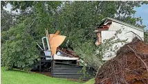  ?? ?? An oak tree that fell in wild weather yesterday afternoon all but destroyed a classroom at Orini Combined School in the Waikato.