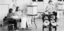  ?? PHOTO: REUTERS ?? A woman arrives to vote with her children in Dublin on Friday as Ireland holds a referendum on liberalisi­ng its law on abortion