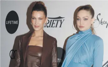  ?? Reuters ?? Bella Hadid, left, and her sister Gigi are among models who donated their clothes this year