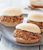  ?? [PHOTO BY JOE KELLER, AMERICA’S TEST KITCHEN/AP] ?? Barbecued pulled chicken sandwiches appear in the “The Complete Cook’s Country TV Cookbook, 10th Anniversar­y Edition.”