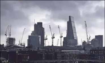  ?? EPA ?? Photo shows rain clouds over London. According to data from Markit’s Purchasing Manager’s Index, the decision by UK to leave the EU has led to a ‘dramatic deteriorat­ion’ in economic activity, the lowest level since April in 2009. Both manufactur­ing and...