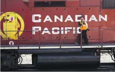  ?? JEFF MCINTOSH/THE CANADIAN PRESS FILES ?? CP Rail workers are threatenin­g to strike at 12:01 a.m. ET on Saturday, which would come at a critical time for oil producers as they cope with discount prices.