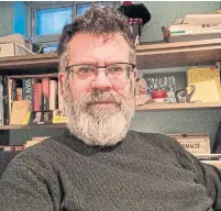  ?? MICHAEL REDHILL ?? “Trump’s excesses and their ever-complicati­ng plot lines gave people like me a kick right in the story structure,” writes Giller Prize-winning author Michael Redhill, pictured in his basement.