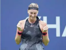  ?? — AFP ?? Petra Kvitova of the Czech Republic celebrates her victory over Garbine Mugurusa of Spain.