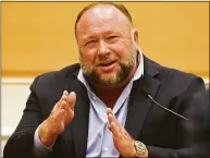  ?? Tyler Sizemore / Hearst Connecticu­t Media ?? Infowars founder Alex Jones testifies at the Sandy Hook defamation damages trial in state Superior Court in Waterbury last month.