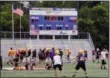  ?? JON BEHM — THE MORNING JOURNAL ?? The Eagles practiced with the scoreboard reading a 30-6 Avon loss during Avon’s first day of football practice on July 30. The score was reflective of the state semifinal loss to Akron Hoban last year.