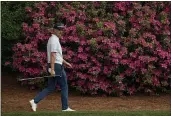  ?? CHARLIE RIEDEL — THE ASSOCIATED PRESS ?? Justin Rose walks on the 12th hole during the first round of the Masters at Augusta National Golf Club on Thursday in Augusta, Ga.