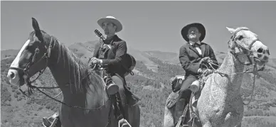  ??  ?? Robert Pattinson (left) and David Zellner star in “Damsel.”