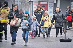  ?? ?? Fleeing Refugees from Ukraine arriving at the Polish border