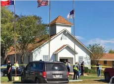  ??  ?? Crime scene: Police outside the First Baptist Church