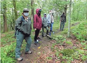  ?? SUBMITTED ?? Rangers and hikers at Edgar Evins State Park are wearing masks on their outing.