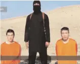  ??  ?? A screen grab, taken from a video, released by IS, shows two Japanese hostages. —