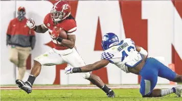  ?? MICKEY WELSH/USA TODAY SPORTS ?? Najee Harris and Alabama have been almost untouchabl­e this season against SEC foes. Harris ranks second in the conference with 797 rushing yards and has scored 16 touchdowns.