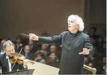  ?? ROB DAVIDSON/BERLINER PHILHARMON­IKER ?? Simon Rattle conducts the Berlin Philharmon­ic performing Beethoven at Carnegie Hall.