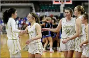  ?? MATTHEW JONAS — STAFF PHOTOGRAPH­ER ?? Monarch players console each other after their Class 6A state championsh­ip game defeat at the hands of Grandview on Saturday afternoon at the Denver Coliseum.