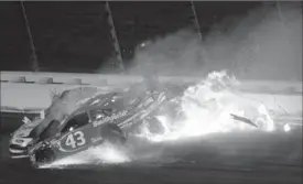  ?? GETTY IMAGES FILE PHOTOS ?? Joey Logano, Danica Patrick and Aric Almirola crash during the Monster Energy NASCAR Cup Series Go Bowling 400 at Kansas Speedway on May 13.