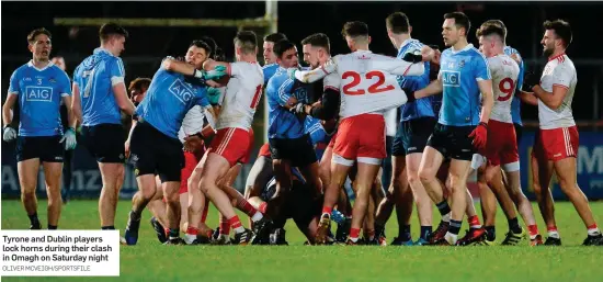  ?? OLIVER MCVEIGH/SPORTSFILE ?? Tyrone and Dublin players lock horns during their clash in Omagh on Saturday night