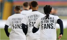  ?? Photograph: Clive Brunskill/Getty Images ?? ▲ Leeds players warm up in an anti-Super League message shared by all the Premier League captains, including Burnley’s Ben Mee.