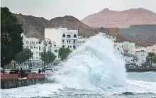  ?? AFP ?? High waves break on the Mutrah sea side promenade in the Omani capital Muscat yesterday.