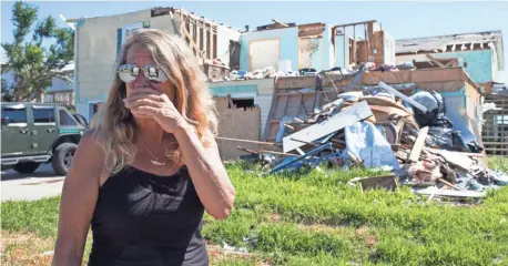  ?? COURTNEY SACCO, USA TODAY NETWORK ?? Michele Green’s company was destroyed by Hurricane Harvey in Rockport, Texas, which received some of the worst damage from the Category 4 storm that roared ashore in August.