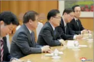  ?? KOREAN CENTRAL NEWS AGENCY — KOREA NEWS SERVICE VIA AP ?? In this Monday photo, provided by the North Korean government on March 6, South Korean National Security Director Chung Eui-yong, center, talks with North Korean leader Kim Jong Un, unseen, in Pyongyang, North Korea.