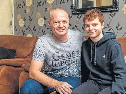  ?? Picture: Steve Brown. ?? Ian Wilson, with his son Aaron, is glad to be alive after a cardiac arrest.