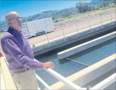  ?? Sean White stands by recycled water at Ukiah Valley Wastewater Treatment Plant in 2019. FILE PHOTO ??