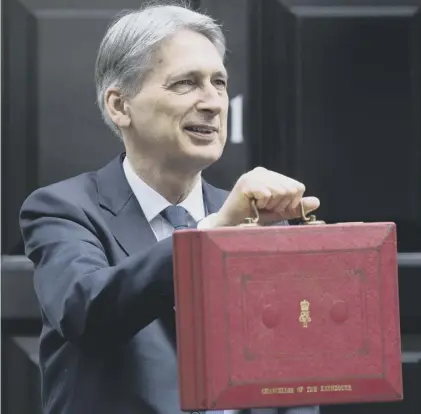  ??  ?? 0 Philip Hammond seems to have run into much fiercer storm of opposition than he might have anticipate­d