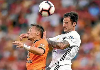  ?? GETTY IMAGES ?? Phoenix defender Tom Doyle, right, competes with Brisbane Roar winger Eric Bautheac during the 0-0 draw last Sunday.