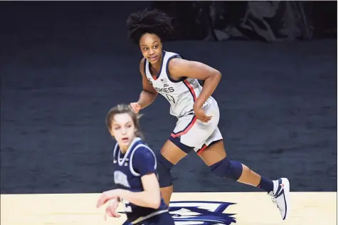  ?? Jessica Hill / Associated Press ?? UConn’s Christyn Williams watches her basket go in during the second half of a Big East-semifinal win over Villanova earlier this month.