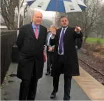 ??  ?? Transport Secretary Chris Grayling is escorted around the basic facilities at Colne station on February 3 by Pendle MP Andrew Stephenson.