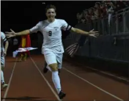  ??  ?? Strath Haven’s Nate Perrins celebrates after scoring the game-winning goal in overtime of the Panthers’ 3-2 win over Holy Ghost Prep’s in the District 1 Class 3A boys soccer final at Upper Merion High School.