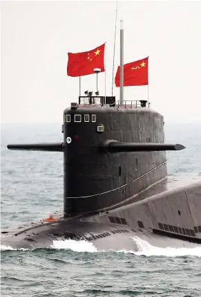  ?? GUANG NIU / AFP / GETTY IMAGES ?? Bu Jianjie, a Chinese official who oversaw research on his country’s navalsubma­rine fleet, is accused of illegally obtaining Canadian citizenshi­p.