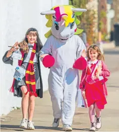  ??  ?? The family have dressed up as all sorts of characters to raise funds for Dundee Dementia Resource Centre.