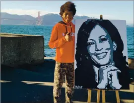  ?? COURTESY OF NICOLE KINDLE ?? Tyler Gordon, 14, of San Jose poses with his painting of Vice President-elect Kamala Harris.