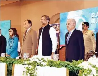  ?? APP ?? Prime Minister Shahid Khaqan Abbasi and other speakers observing a minute of silence in respect of victims of terrorism at the closing session of the Islamabad Internatio­nal Counter Terrorism Forum 2018 on Thursday. —