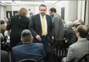  ?? MATT ROURKE — THE ASSOCIATED PRESS ?? Pennsylvan­ia Department of State official, Jonathan Marks, departs after testifying before the House State Government Committee in Harrisburg, Pa., Wednesday. Marks said non-citizen immigrants illegally voted hundreds of times in elections spanning 18...