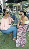  ??  ?? Micarla Hart and Ilga Wildeman having a relaxed Sunday at the Joburg Wine Club event at Broadacres.