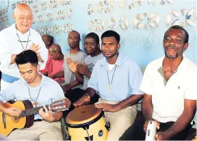  ??  ?? Father Ho Lung and residents singing and praising God for His goodness at Good Shepherd Home.