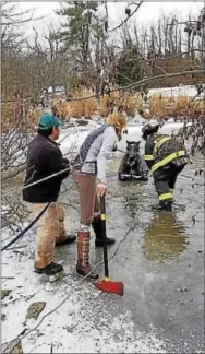  ?? SUBMITTED PHOTO — EAST WHITELAND FIRE COMPANY ?? Emergency crews worked to free a horse that had fallen through some ice.