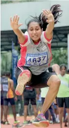  ?? Pic by Amila Gamage ?? Savithra Weerakoon of DFCC Bank in action in the Women's Over-45 Long Jump.