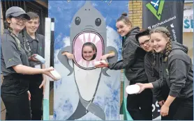  ?? ?? Police Scotland youth volunteers were handy at the shark attack stand raising funds for a skatepark in 2019.